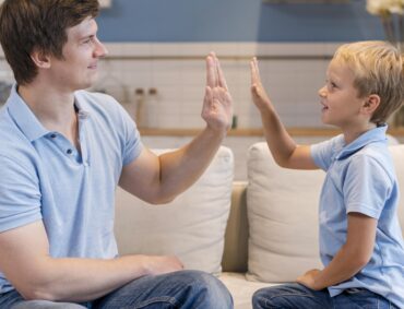 Parent Giving Support and Encouragement to a Special Child